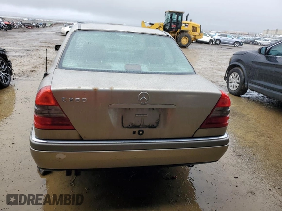 1997 Mercedes-Benz C with VIN WDBHA28E3VF530316, listed as a Copart auction lot 85938384 with 169,664 mi miles and Salvage Title. Bid and sale history available at carsss.com. Image 6.