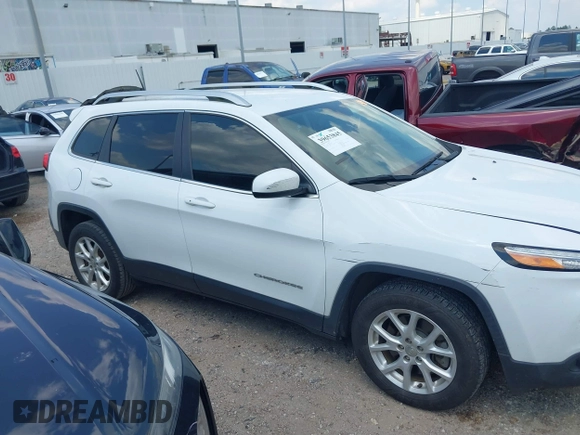 2018 Jeep Cherokee Latitude Plus with VIN 1C4PJLLBXJD590695, listed as a IAAI auction lot 39653845 with 76,667 mi miles and . Bid and sale history available at DreamBid. Image 13.