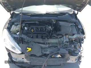 2016 Ford Focus SE z VIN 1FADP3F25GL338158, wystawiony jako IAAI lot #39234785 z przebiegiem 77 333 mil mil oraz . Historia ofert i sprzedaży dostępna na DreamBid. Obrazek 10.