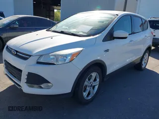 2014 Ford Escape SE with VIN 1FMCU9G90EUC24911, listed as a IAAI auction lot 42068333 with 209,268 mi miles. Bid and sale history available at carsss.com. Image 2.