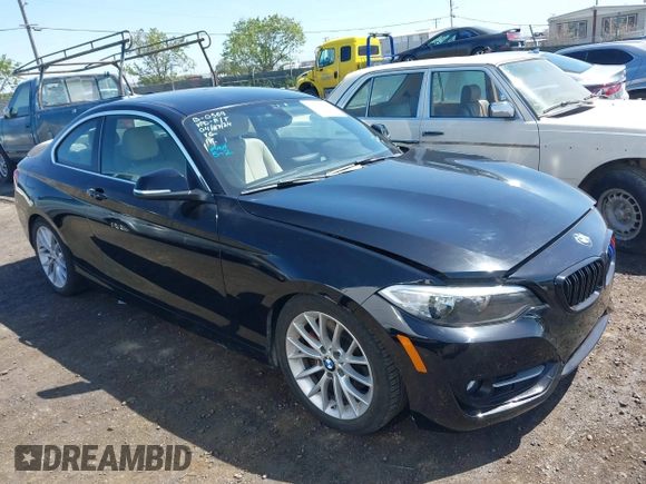 2016 BMW 2 Series 228i with VIN WBA1F9C5XGV545664, listed as a IAAI auction lot 39327505 with 94,583 mi miles. Bid and sale history available at carsss.com. Image 1.