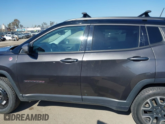 2019 Jeep Compass Trailhawk with VIN 3C4NJDDB3KT759849, listed as a IAAI auction lot 42141467 with 100,915 mi miles and . Bid and sale history available at DreamBid. Image 14.