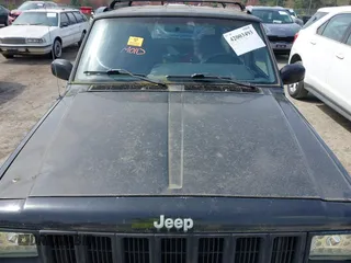 1997 Jeep Cherokee Sport with VIN 1J4FJ68S9VL517300, listed as a IAAI auction lot 42003493 with Not provided miles and . Bid and sale history available at DreamBid. Image 10.
