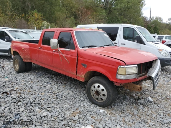 1996 Ford F-350 Crew Cab with VIN 1FTJW35F3TEB59586, listed as a Copart auction lot 79329304 with NaN miles and Salvage Title. Bid and sale history available at carsss.com. Image 4.