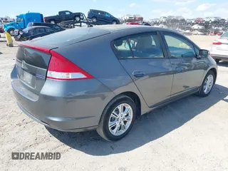 2010 Honda Insight EX z VIN JHMZE2H72AS036072, wystawiony jako IAAI lot #42139823 z przebiegiem 257 511 mil mil oraz . Historia ofert i sprzedaży dostępna na DreamBid. Obrazek 4.
