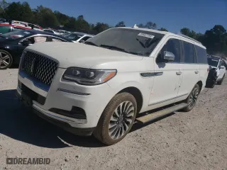 2022 Lincoln Navigator Black Label with VIN 5LMJJ2TT4NEL09900, listed as a Copart auction lot 74687794 with 0 mi miles and Salvage Title. Bid and sale history available at carsss.com. Image 1.