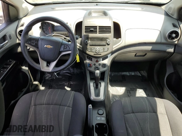 2014 Chevrolet Sonic LT z VIN 1G1JC5SH9E4199067, wystawiony jako Copart lot #61065235 z przebiegiem Nie podano mil oraz Szkoda całkowita • Salvage title. Historia ofert i sprzedaży dostępna na DreamBid. Obrazek 8.