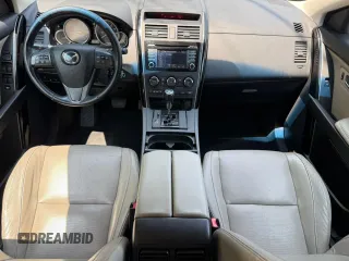 2014 Mazda CX-9 Touring с VIN JM3TB3CV2E0430544, выставлен на аукционе Copart как лот 65481395 с пробегом 135 785 миль миль и Чистый • Clean title. История ставок и продаж доступна на DreamBid. Изображение 9.