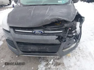 2015 Ford Escape SE with VIN 1FMCU9G90FUB35065, listed as a IAAI auction lot 41165956 with 131,485 mi miles. Bid and sale history available at carsss.com. Image 14.