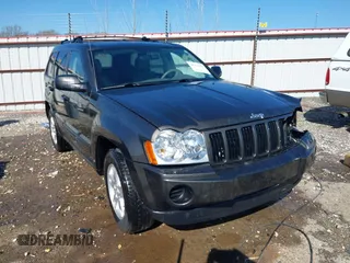 2006 Jeep Grand Cherokee Laredo with VIN 1J4GR48K56C326847, listed as a IAAI auction lot 41972623 with 141,088 mi miles. Bid and sale history available at carsss.com. Image 1.