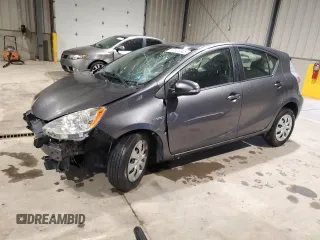 2014 Toyota Prius One z VIN JTDKDTB32E1076293, wystawiony jako Copart lot #57522345 z przebiegiem Nie podano mil oraz Szkoda całkowita • Salvage title. Historia ofert i sprzedaży dostępna na DreamBid. Obrazek 1.