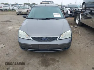 2007 Ford Focus S z VIN 1FAFP37N07W343784, wystawiony jako IAAI lot #42036642 z przebiegiem 223 104 mil mil oraz . Historia ofert i sprzedaży dostępna na DreamBid. Obrazek 6.