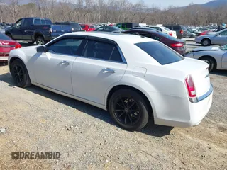 2012 Chrysler 300 Limited with VIN 2C3CCACG8CH252814, listed as a IAAI auction lot 41780016 with 176,901 mi miles. Bid and sale history available at carsss.com. Image 3.