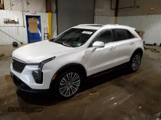 2024 Cadillac XT4 AWD Premium Luxury with VIN 1GYFZDR49RF100387, listed as a Copart auction lot 76304794 with 14,649 mi miles and Salvage Title. Bid and sale history available at carsss.com. Image 1.