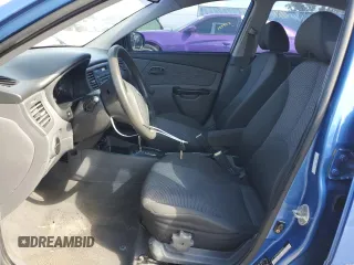 2010 Kia Rio LX with VIN KNADH4A33A6632951, listed as a Copart auction lot 72629144 with 168,289 mi miles and Salvage Title. Bid and sale history available at DreamBid. Image 7.