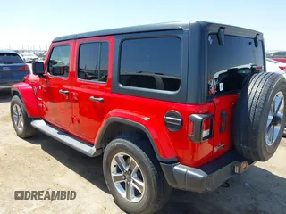 2019 Jeep Wrangler Unlimited Sahara with VIN 1C4HJXEN8KW591398, listed as a IAAI auction lot 42045071 with 87,410 mi miles and . Bid and sale history available at DreamBid. Image 3.