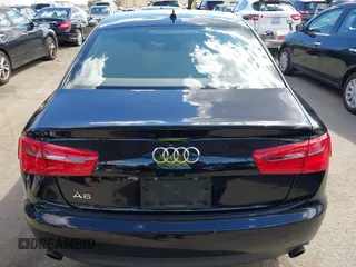 2014 Audi A6 2.0T Premium Plus with VIN WAUGFAFC7EN028549, listed as a IAAI auction lot 41948470 with 141,557 mi miles. Bid and sale history available at carsss.com. Image 16.