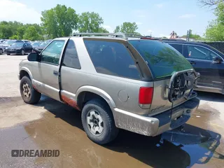 1999 Chevrolet Blazer LS с VIN 1GNCT18W3XK116060, выставлен на аукционе IAAI как лот 42213762 с пробегом 216 788 миль миль и . История ставок и продаж доступна на DreamBid. Изображение 3.
