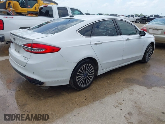 2017 Ford Fusion Titanium с VIN 3FA6P0K9XHR146909, выставлен на аукционе IAAI как лот 42588301 с пробегом 217 885 миль миль и . История ставок и продаж доступна на DreamBid. Изображение 4.