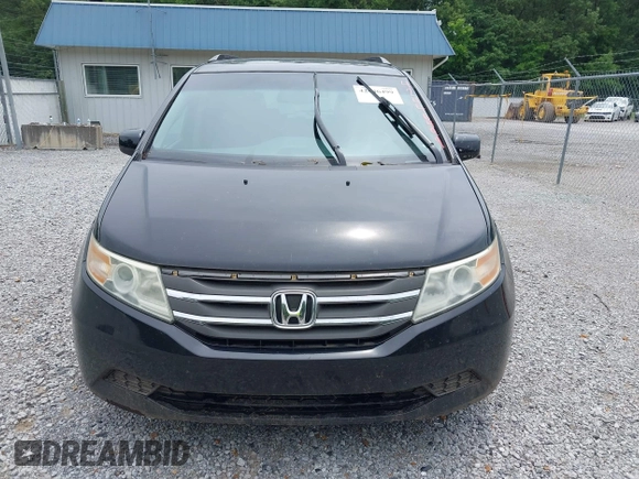 2012 Honda Odyssey EX-L with VIN 5FNRL5H66CB095996, listed as a IAAI auction lot 42446499 with 198,016 mi miles and . Bid and sale history available at DreamBid. Image 12.