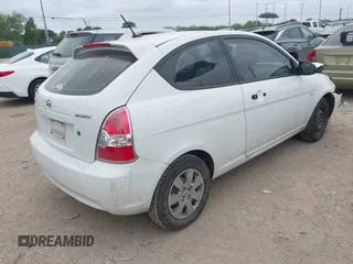2009 Hyundai Accent GS z VIN KMHCM36C89U131456, wystawiony jako IAAI lot #42366254 z przebiegiem 121 558 mil mil oraz . Historia ofert i sprzedaży dostępna na DreamBid. Obrazek 4.