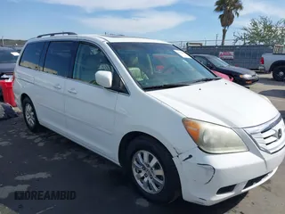 2009 Honda Odyssey EX-L with VIN 5FNRL38769B011424, listed as a IAAI auction lot 41646007 with 127,684 mi miles. Bid and sale history available at carsss.com. Image 1.