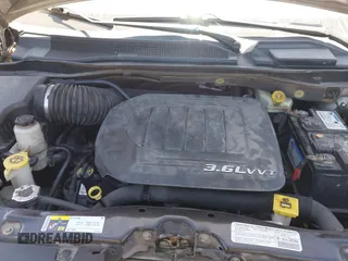 2013 Dodge Grand Caravan SE with VIN 2C4RDGBG0DR702913, listed as a IAAI auction lot 42007786 with 163,981 mi miles and . Bid and sale history available at DreamBid. Image 10.
