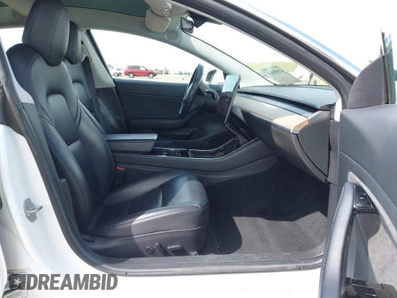 2018 Tesla Model 3 Long Range Battery with VIN 5YJ3E1EA2JF023370, listed as a IAAI auction lot 42008406 with 163,474 mi miles and . Bid and sale history available at DreamBid. Image 5.
