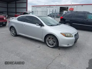 2009 Scion tC with VIN JTKDE167190282930, listed as a IAAI auction lot 42034538 with 198,964 mi miles. Bid and sale history available at carsss.com. Image 1.