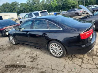 2014 Audi A6 Prestige with VIN WAUHGAFCXEN008586, listed as a Copart auction lot 60304815 with 133,577 mi miles and Salvage title. Bid and sale history available at DreamBid. Image 2.