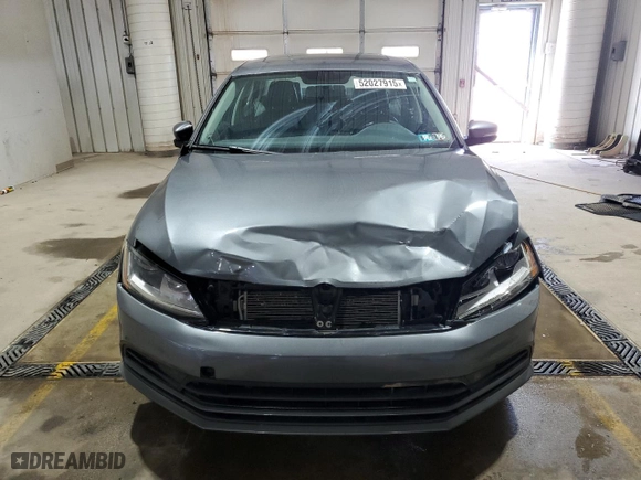 2017 Volkswagen Jetta 1.4T SE with VIN 3VWB67AJ7HM318369, listed as a Copart auction lot 52027915 with 128,335 mi miles and Salvage Title. Bid and sale history available at carsss.com. Image 5.