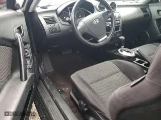 2006 Hyundai Tiburon GS with VIN KMHHM65DX6U225464, listed as a Copart auction lot 83561984 with 182,245 mi miles and Salvage Title. Bid and sale history available at carsss.com. Image 8.