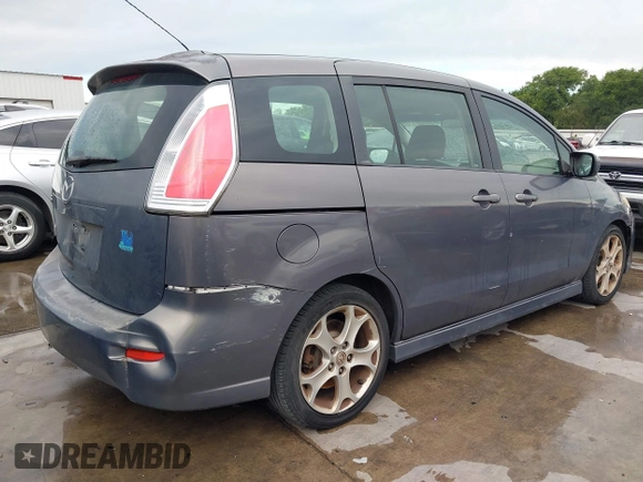 2010 Mazda 5 Sport z VIN JM1CR2W37A0387373, wystawiony jako IAAI lot #42356053 z przebiegiem 130 913 mil mil oraz . Historia ofert i sprzedaży dostępna na DreamBid. Obrazek 4.