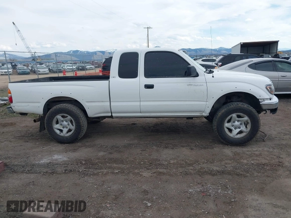2003 Toyota Tacoma with VIN 5TEWN72N23Z246937, listed as a IAAI auction lot 41868085 with 220,973 mi miles. Bid and sale history available at carsss.com. Image 13.