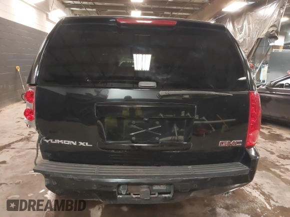 2013 GMC Yukon XL SLT with VIN 1GKS2KE76DR301365, listed as a IAAI auction lot 41379118 with 108,569 mi miles. Bid and sale history available at carsss.com. Image 17.