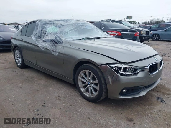 2018 BMW 3 Series 320i with VIN WBA8E1G51JNU92342, listed as a IAAI auction lot 41641934 with 27,477 mi miles. Bid and sale history available at carsss.com. Image 1.