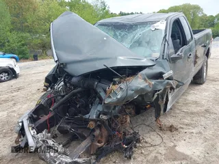 2004 Ford F-150 XL with VIN 1FTRF14W14NB97084, listed as a IAAI auction lot 42243709 with Not provided miles and . Bid and sale history available at DreamBid. Image 6.