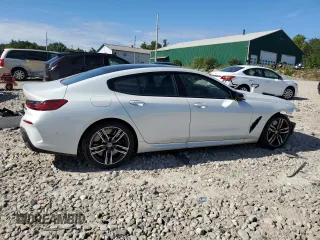 2023 BMW 8 Series M850i with VIN WBAGV8C01PCM79724, listed as a Copart auction lot 69486194 with 14,285 mi miles and Salvage title. Bid and sale history available at DreamBid. Image 3.