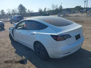 2022 Tesla Model 3 with VIN 5YJ3E1EA5NF315004, listed as a IAAI auction lot 41429800 with Not Provided miles. Bid and sale history available at carsss.com. Image 3.