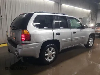2004 GMC Envoy SLE with VIN 1GKDS13S742369547, listed as a Copart auction lot 51507445 with 119,824 mi miles and Salvage Title. Bid and sale history available at carsss.com. Image 3.
