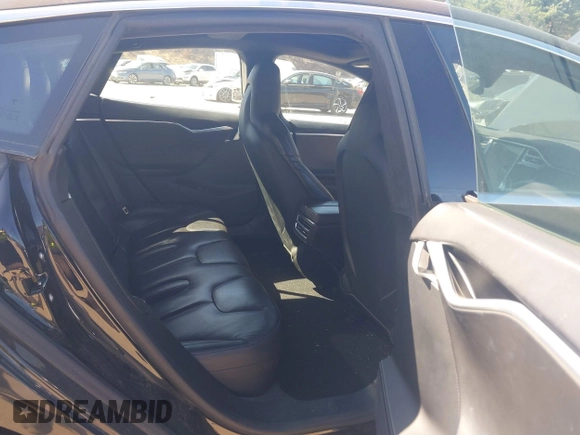 2016 Tesla Model S 90D with VIN 5YJSA1E21GF140740, listed as a IAAI auction lot 42062461 with 237,943 mi miles and . Bid and sale history available at DreamBid. Image 8.