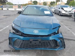 2025 Toyota Camry LE z VIN 4T1DAACK3SU571104, wystawiony jako IAAI lot #42084430 z przebiegiem 1 013 mil mil oraz . Historia ofert i sprzedaży dostępna na DreamBid. Obrazek 12.