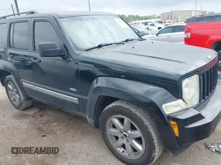 2012 Jeep Liberty Sport z VIN 1C4PJLAK1CW166851, wystawiony jako IAAI lot #41935903 z przebiegiem 205 807 mil mil oraz . Historia ofert i sprzedaży dostępna na DreamBid. Obrazek 1.
