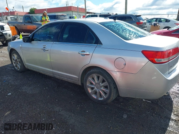2012 Lincoln MKZ z VIN 3LNHL2GC2CR821896, wystawiony jako IAAI lot #42389103 z przebiegiem 253 804 mil mil oraz . Historia ofert i sprzedaży dostępna na DreamBid. Obrazek 3.