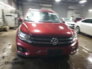 2013 Volkswagen Tiguan SE z VIN WVGBV3AX8DW092397, wystawiony jako Copart lot #51956225 z przebiegiem 138 901 mil mil oraz Szkoda całkowita • Salvage title. Historia ofert i sprzedaży dostępna na DreamBid. Obrazek 13.