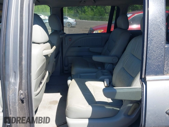2008 Honda Odyssey EX-L z VIN 5FNRL38768B063991, wystawiony jako IAAI lot #42009031 z przebiegiem 167 524 mil mil oraz . Historia ofert i sprzedaży dostępna na DreamBid. Obrazek 8.