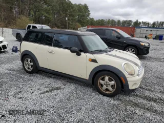 2010 MINI Clubman z VIN WMWML3C55ATX38164, wystawiony jako Copart lot #87336264 z przebiegiem 127 934 mil mil oraz Czysty tytuł • Clean title. Historia ofert i sprzedaży dostępna na DreamBid. Obrazek 4.