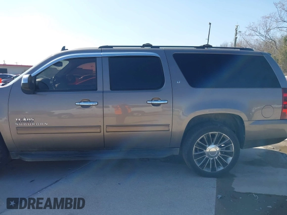 2011 Chevrolet Suburban LT with VIN 1GNSCJE03BR381301, listed as a IAAI auction lot 41412636 with 243,601 mi miles. Bid and sale history available at carsss.com. Image 14.