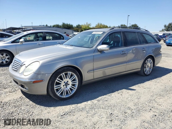 2005 Mercedes-Benz E 500 with VIN WDBUH83J35X168838, listed as a Copart auction lot 69885014 with 203,187 mi miles and Salvage Title. Bid and sale history available at carsss.com. Image 1.