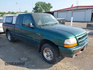 1999 Ford Ranger XL with VIN 1FTYR14V3XPA90413, listed as a IAAI auction lot 42729164 with 256,745 mi miles and . Bid and sale history available at DreamBid. Image 1.
